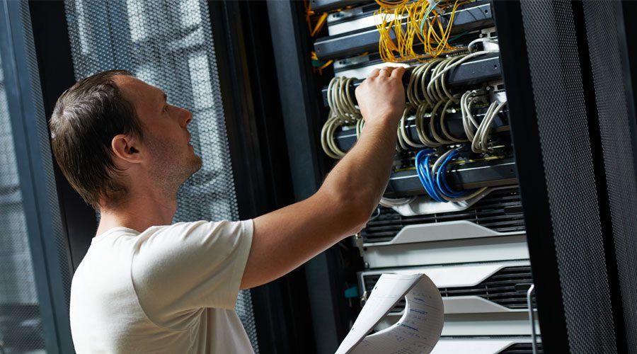 Data-Center-Tech-Checking-Cables
