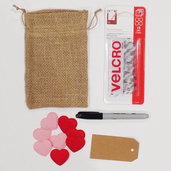 Supplies for VELCRO(R) Brand's DIY tic-tac-toe game for Valentine's Day.