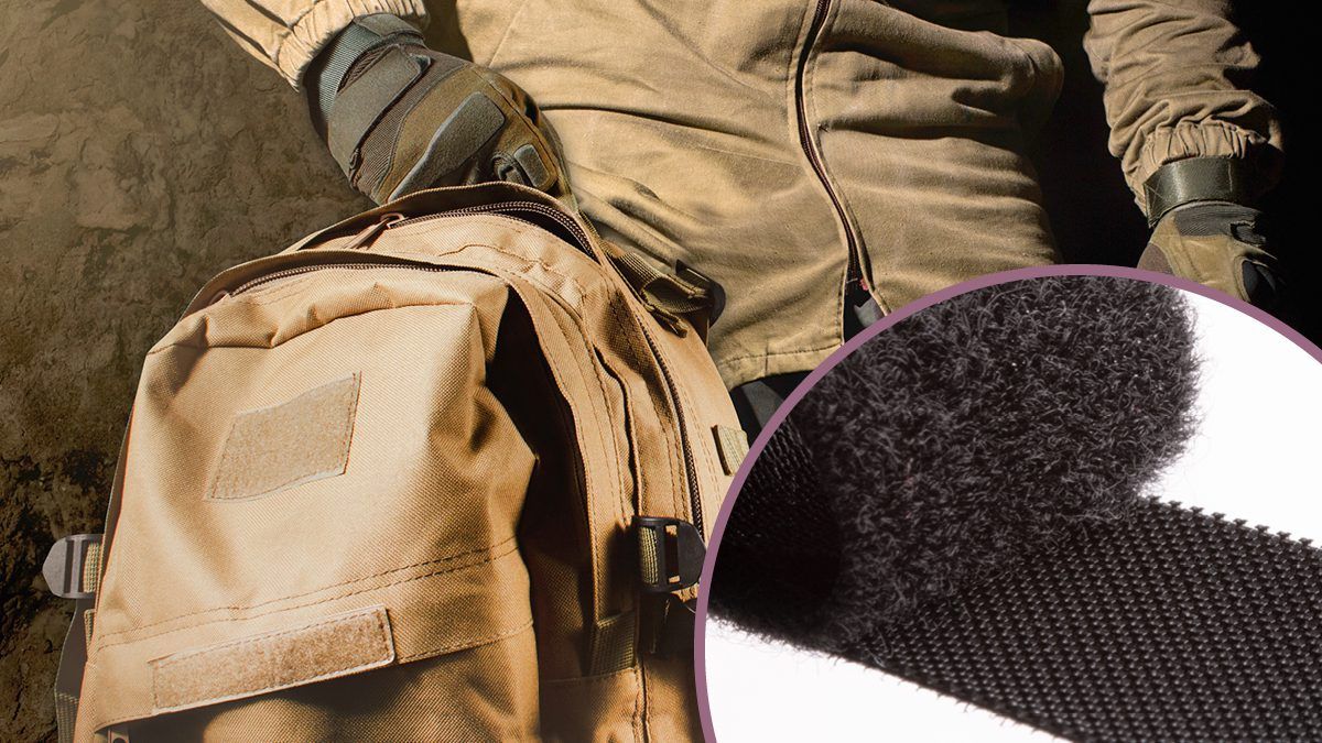 Tactical backpack with VELCRO® Brand hook and loop fasteners, shown in use with gloves and gear for rugged accessory applications.