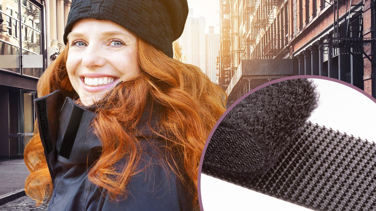 Urban fashion look featuring VELCRO® Brand hook and loop fasteners, shown on outerwear in a city street setting.