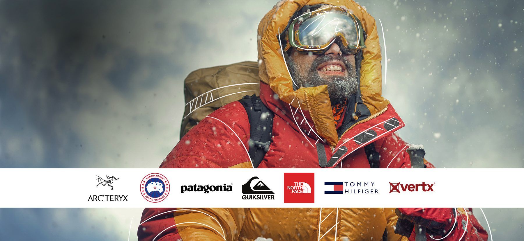 Mountaineer in red and yellow jacket with backpack in snowy weather, featuring logos of Arc'teryx, Patagonia, The North Face, and other outdoor brands.