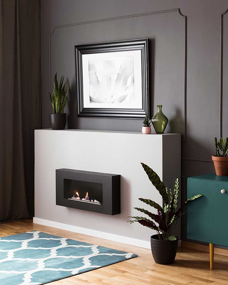 how high to hang pictures - above a fireplace