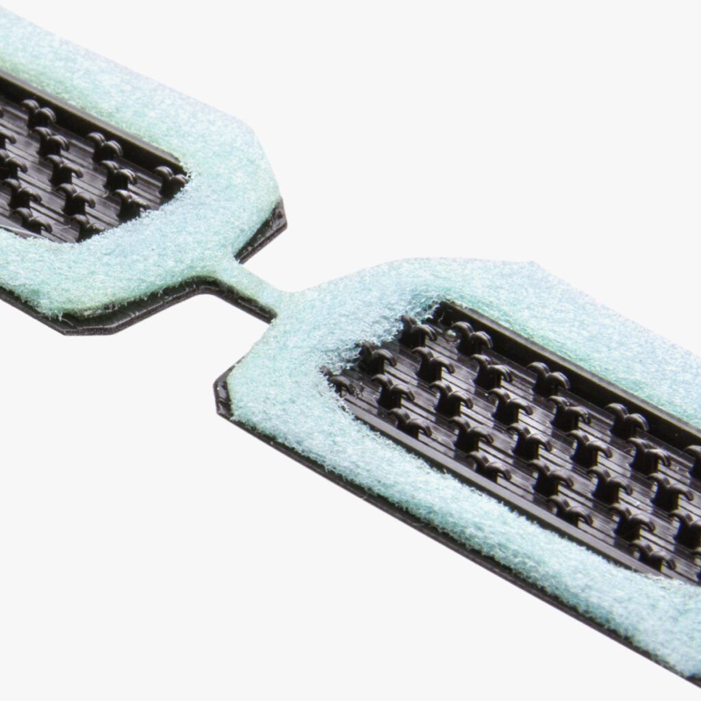 Low profile hook and loop for transportation seating