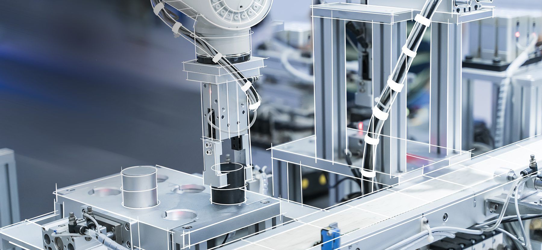 VELCRO® Brand industrial robotic arm applying hook and loop fasteners on a manufacturing line, showcasing precision fastening solutions.