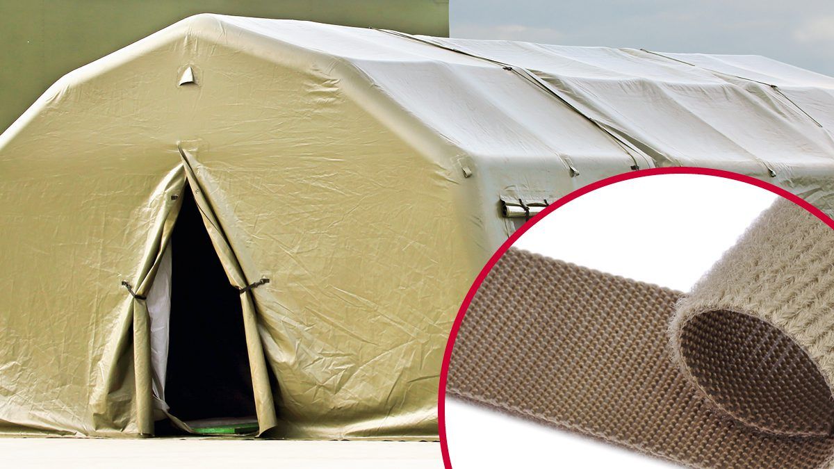 Outdoor military-grade tent with an open entrance, constructed using durable materials and secured with VELCRO® Brand hook and loop fasteners, demonstrating military fasteners and VELCRO® Brand solutions for tactical shelter applications.