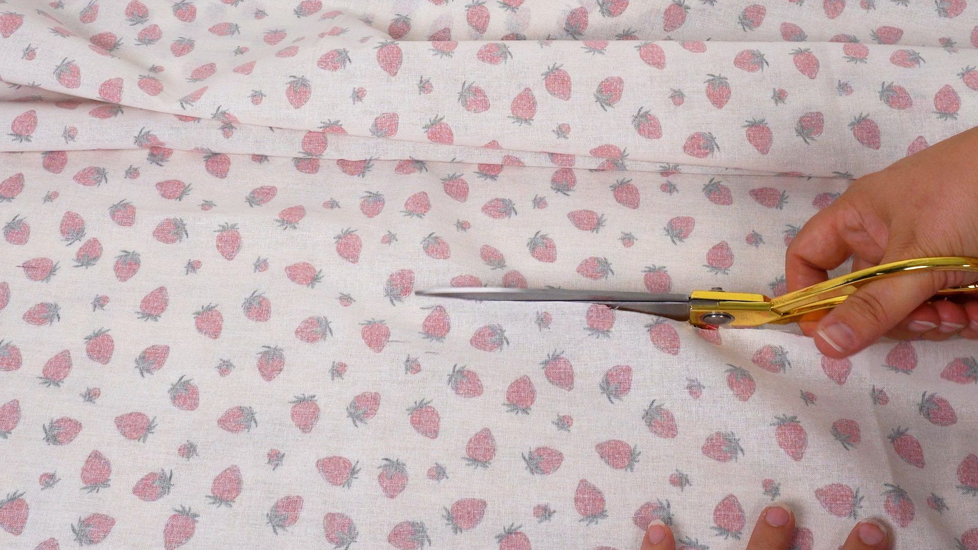 scissors cutting fabric