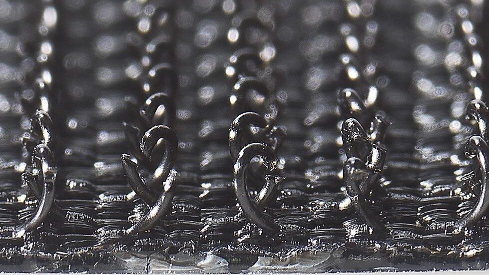 Close-up of black woven hook from VELCRO® Brand original hook and loop fastener